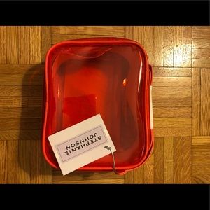 Stephanie Johnson travel case or purse.